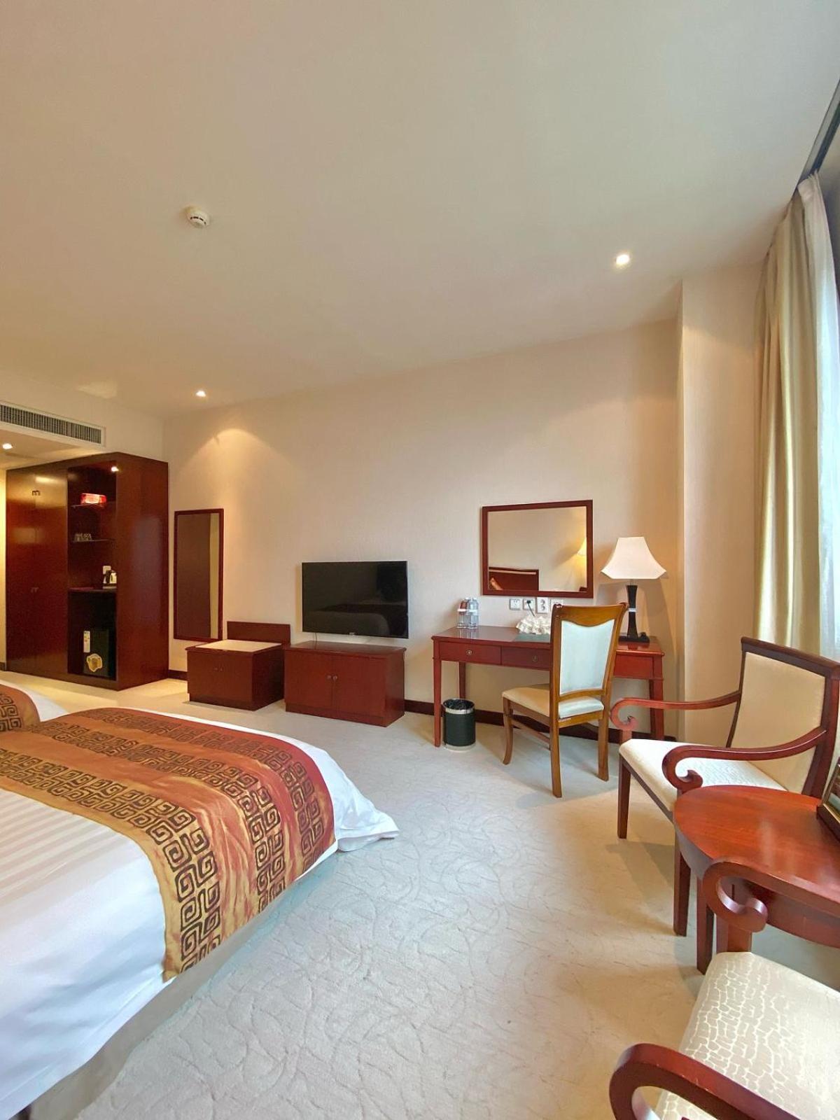 Beijing Palace Soluxe Hotel Astana Ngoại thất bức ảnh A room at the hotel