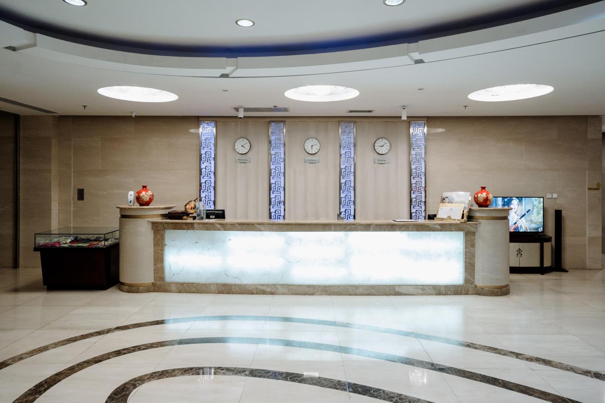 Beijing Palace Soluxe Hotel Astana Ngoại thất bức ảnh Reception desk